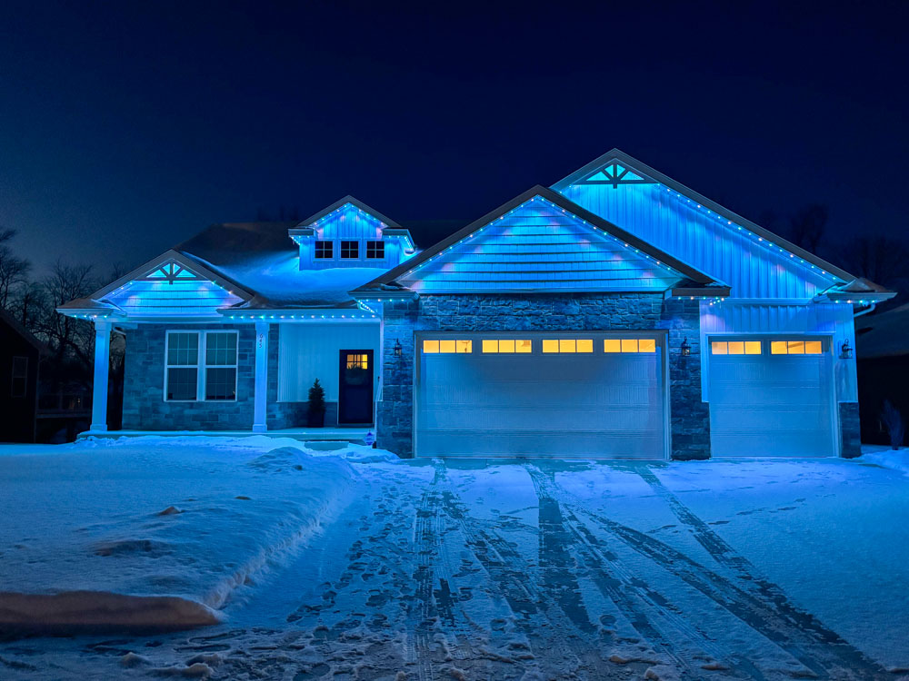 Home illuminated by Meridian Outdoor Lighting at night