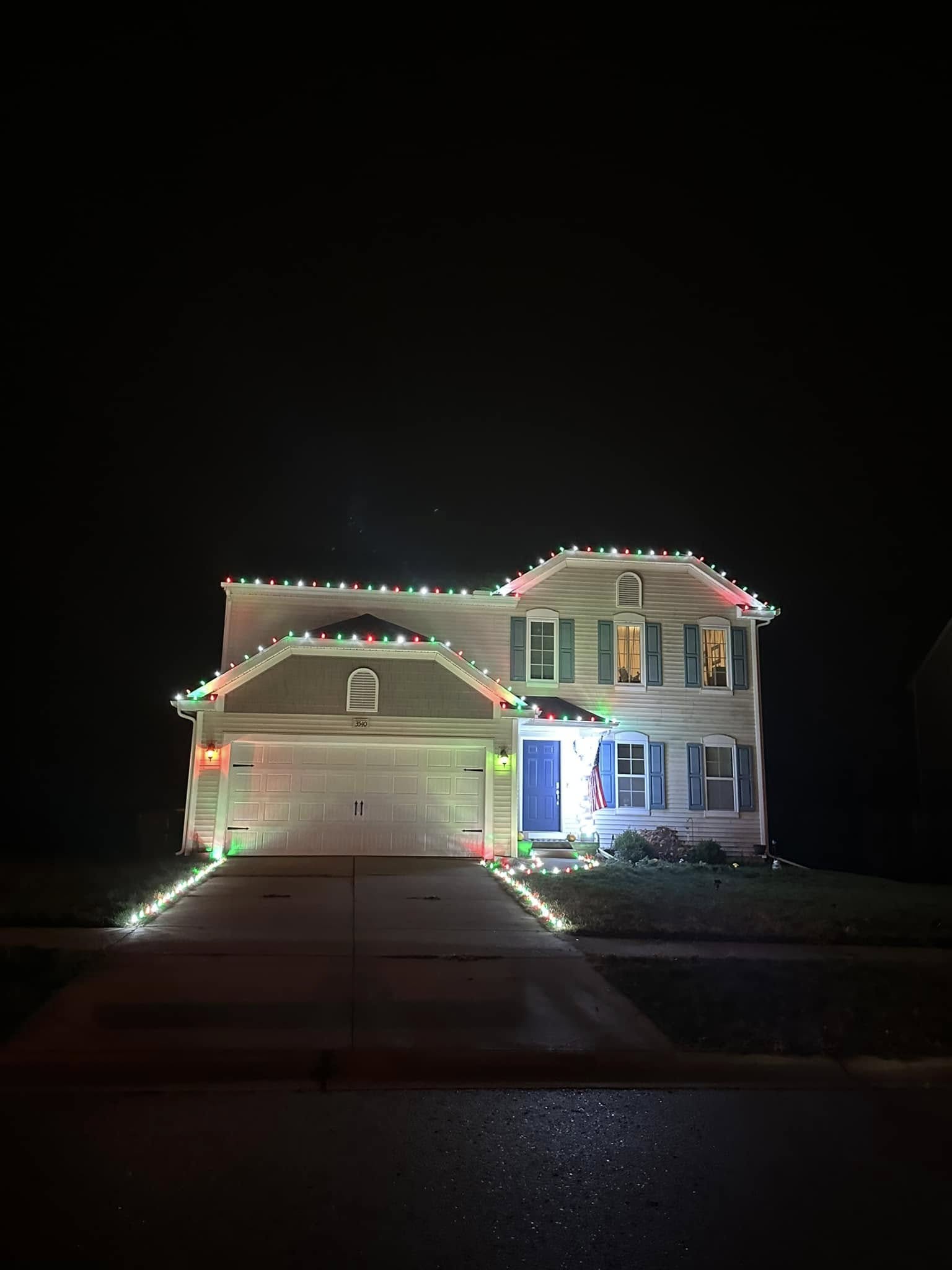 Custom-fit holiday lighting with clean straight lines along a roofline