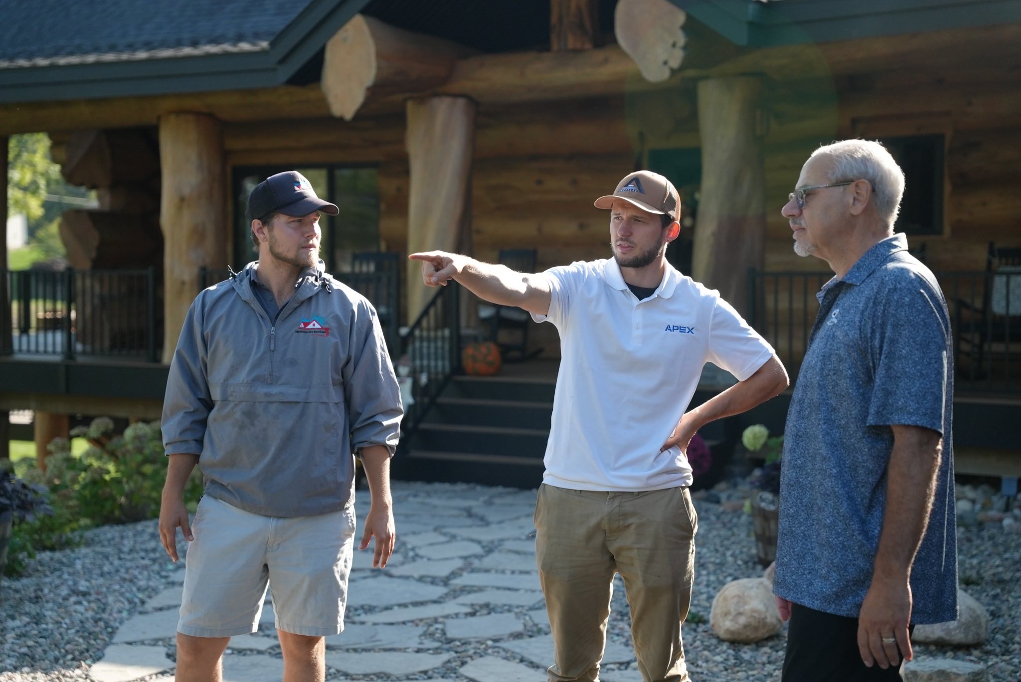 Professional landscape lighting highlighting trees and walkways at night